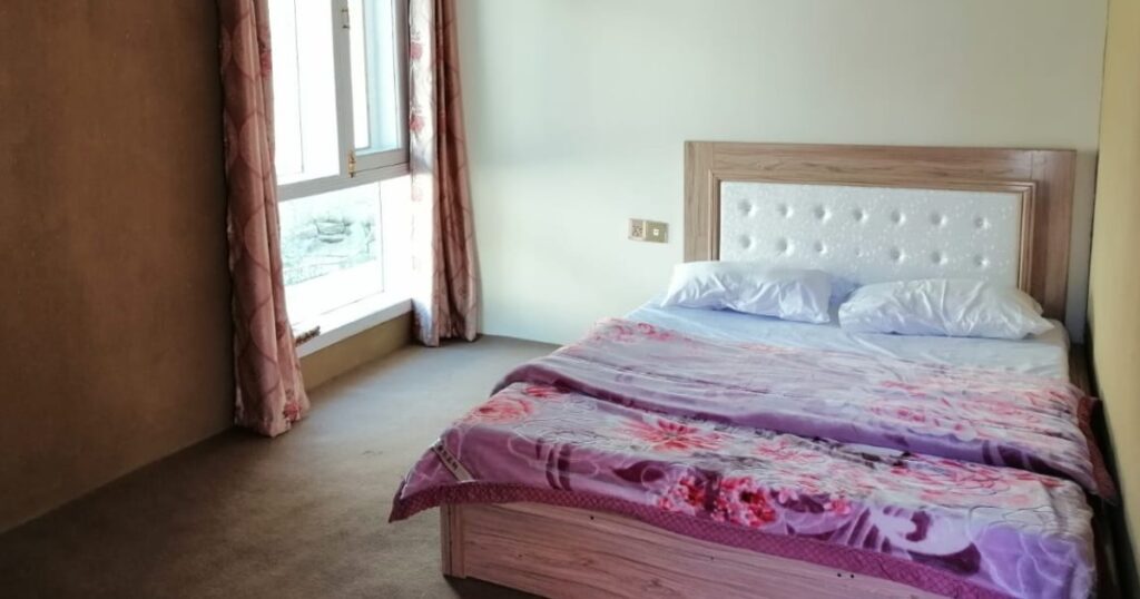 Darwesh Hotel Hunza bed room