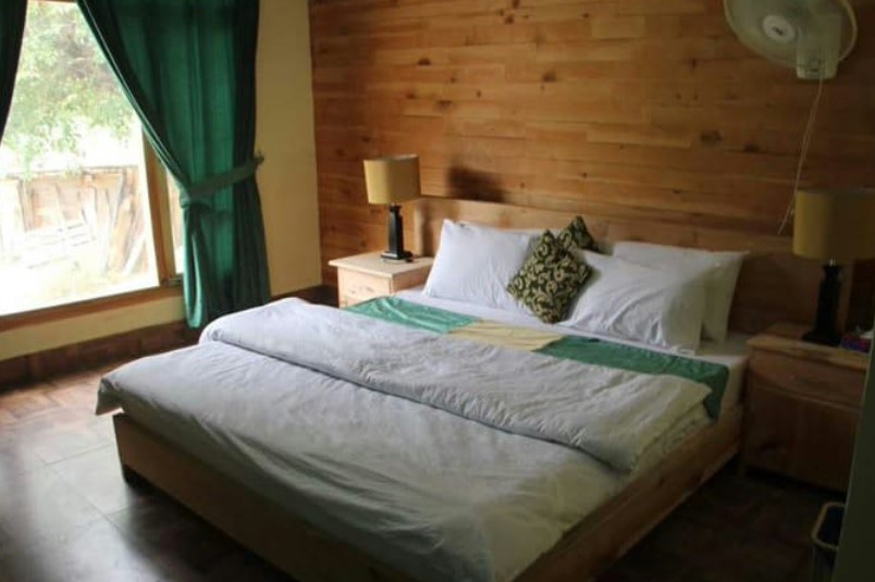 Green Village Resorts bed room
