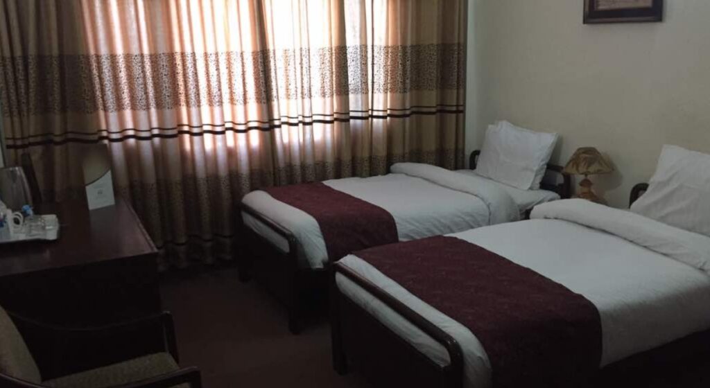 Hotel One Skardu bed room