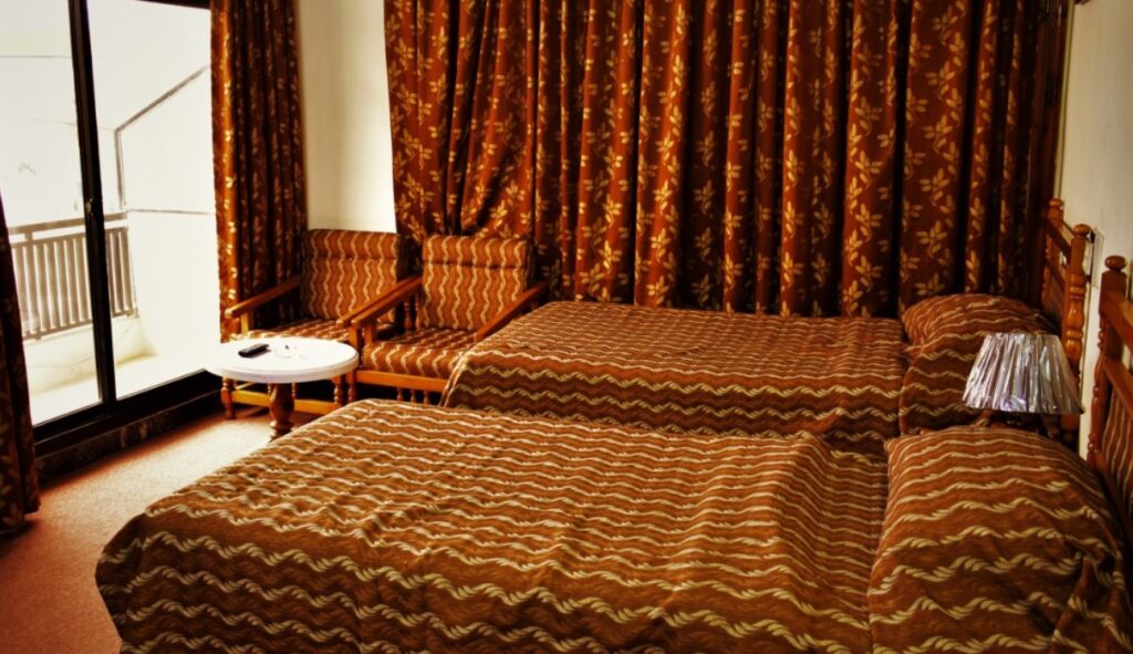 Hotel Swat Regency bedroom
