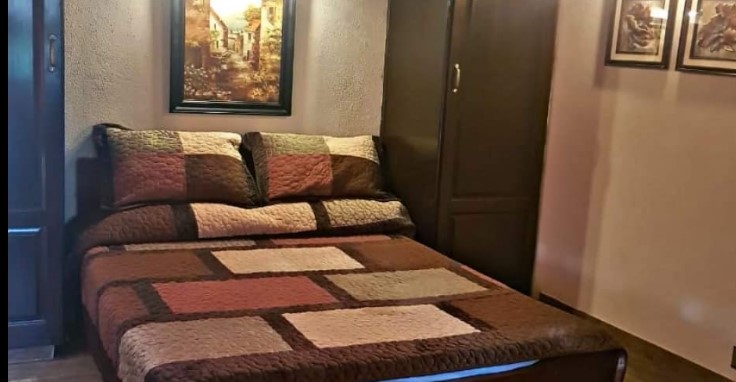 Mayfair Resort bed room