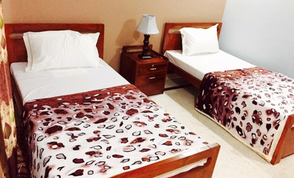 Muzaffarabad View Hotel bed-room