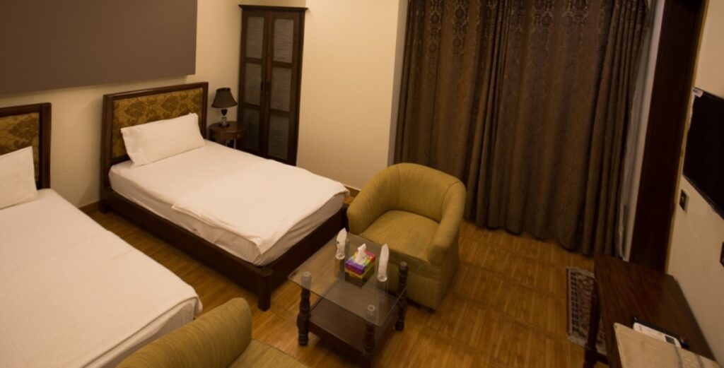Neelam View Hotel bed room