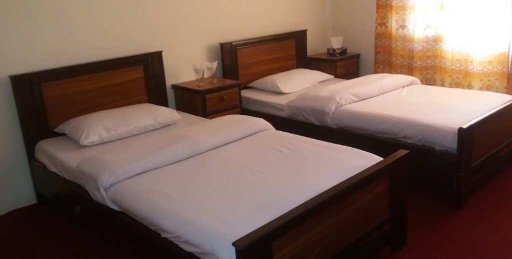 Shalimar Hotel bed room